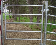 5 Rail Galvanized Post and Rail Man Gate to Match Fence, with closure post anchored to barn